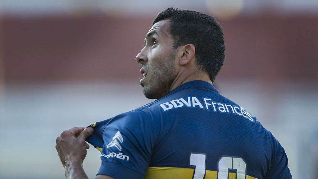 Boca Juniors' forward Carlos Tevez celebrates after scoring a goal against Argentinos Juniors during their Argentina First Division football match at Diego Armando Maradona stadium, on September 19, 2015. Boca Juniors won by 3-1. AFP PHOTO / ALEJANDRO PAGNI (Photo credit should read ALEJANDRO PAGNI/AFP via Getty Images)
