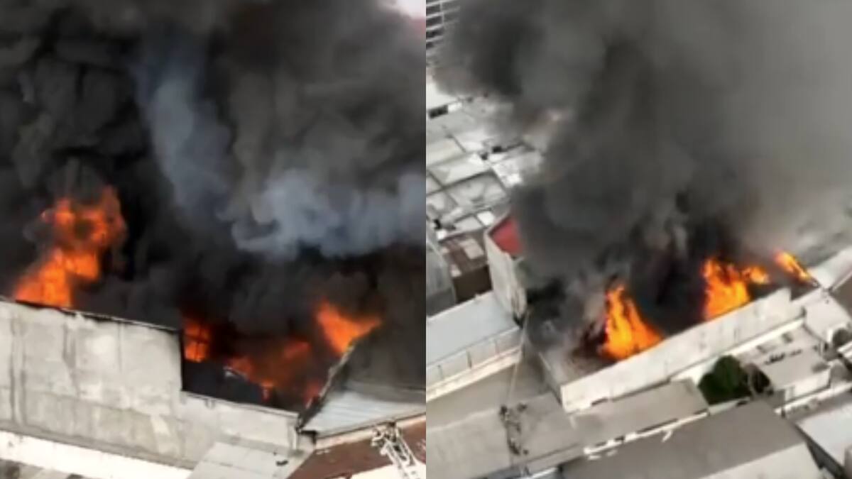 Megaincendio en pleno centro de Santiago: llamas consumen bodegas en barrio universitario provocando una gran columna de humo