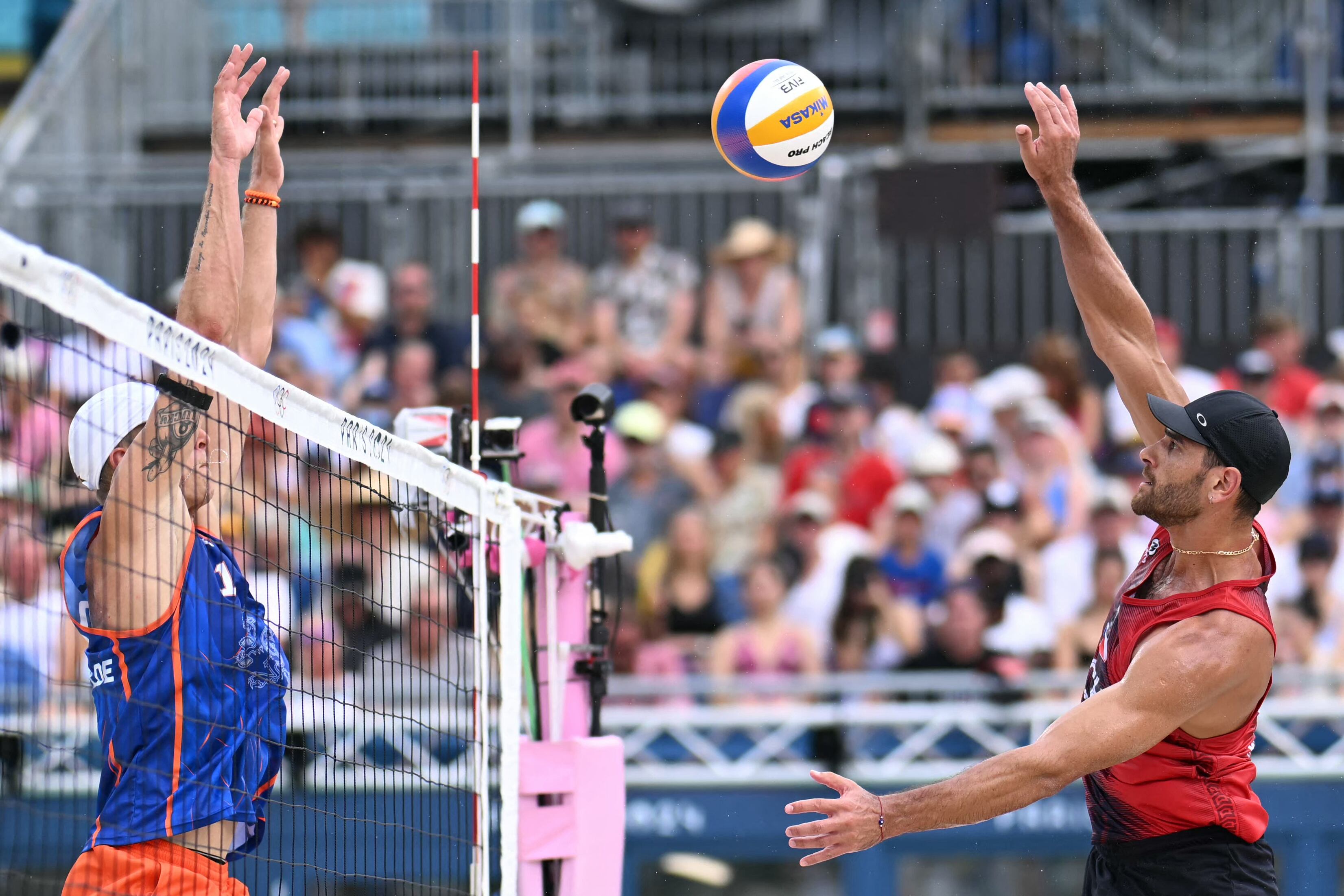 Marco Grimalt versus Steven Van De Velde blocks. Getty Images