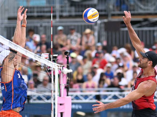 Marco Grimalt versus Steven Van De Velde blocks. Getty Images