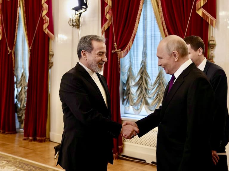 ST PETERSBURG, RUSSIA - APRIL 27: (----EDITORIAL USE ONLY - MANDATORY CREDIT - 'FOREIGN MINISTRY OF IRAN / HANDOUT' - NO MARKETING NO ADVERTISING CAMPAIGNS - DISTRIBUTED AS A SERVICE TO CLIENTS----) Iranâs Foreign Minister Abbas Araghchi (L) meets with the Russian President Vladimir Putin (R) in St. Petersburg, Russia on April 27, 2026. (Photo by Foreign Ministry of Iran / Handout/Anadolu via Getty Images)