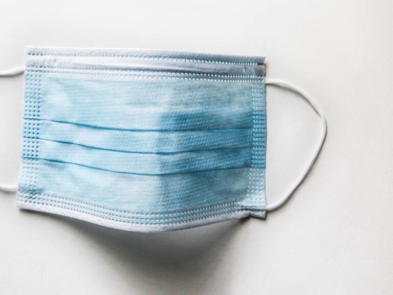 Surgical mask on white background