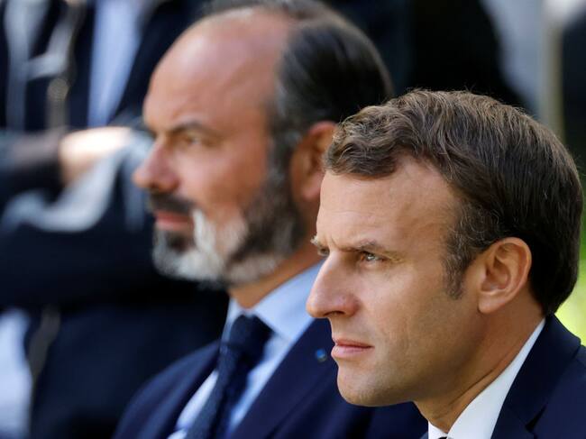 Emmanuel Macron acompañado de Philippe