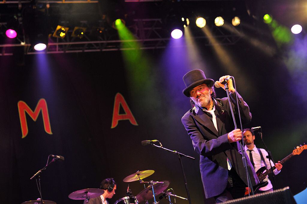 WILTSHIRE, UNITED KINGDOM - JULY 25: Rachid Taha performs on stage during Day 1 of the WOMAD Festival 2013 at Charlton Park on July 25, 2013 in Wiltshire, England. (Photo by C Brandon/Redferns via Getty Images)