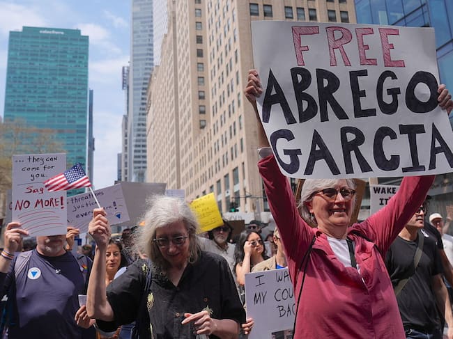 NEW YORK CITY, UNITED STATES APRIL 19: Protesters march through the streets of Manhattan during a demonstration against the administration of President Donald Trump in New York City on April 19, 2025. Thousands gathered with banners and signs to voice their opposition to the government's policies. (Photo by Selcuk Acar/Anadolu via Getty Images)