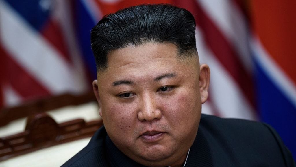 TOPSHOT - North Korea's leader Kim Jong Un before a meeting with US President Donald Trump on the south side of the Military Demarcation Line that divides North and South Korea, in the Joint Security Area (JSA) of Panmunjom in the Demilitarized zone (DMZ) on June 30, 2019. (Photo by Brendan Smialowski / AFP) (Photo credit should read BRENDAN SMIALOWSKI/AFP via Getty Images)