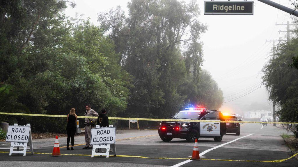 Trabuco Canyon, CA - August 24: El Toro Road is closed at Ridgeline Road as officials investigate a shooting at Cook's Corner in Trabuco Canyon, CA on Thursday, August 24, 2023. (Photo by Paul Bersebach/MediaNews Group/Orange County Register via Getty Images)
