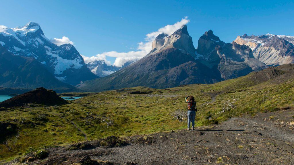 CHILE - 2016/12/04: View of Cuernos del Paine Mountains from Salto Grande trail with hikers in Torres del Paine National Park in southern Chile. (Photo by Wolfgang Kaehler/LightRocket via Getty Images)