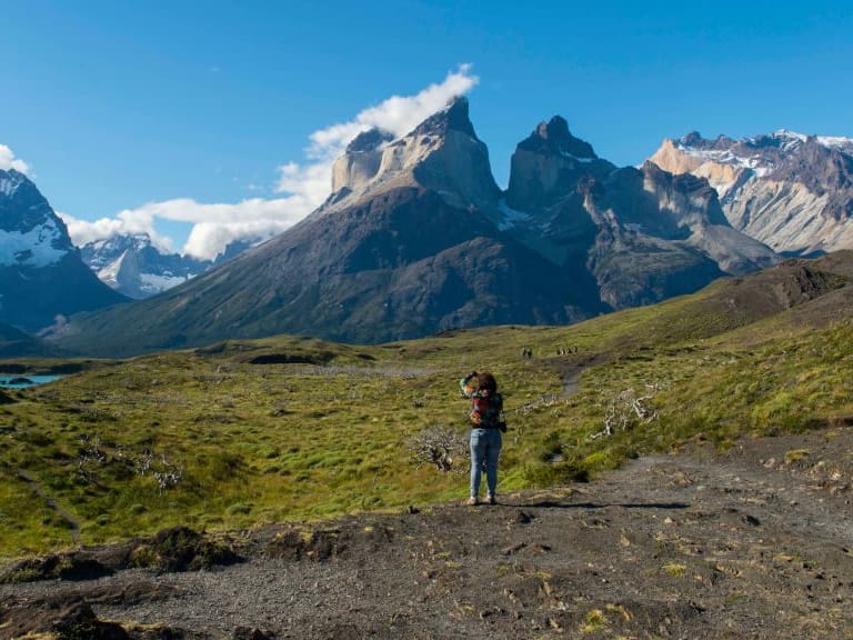 CHILE - 2016/12/04: View of Cuernos del Paine Mountains from Salto Grande trail with hikers in Torres del Paine National Park in southern Chile. (Photo by Wolfgang Kaehler/LightRocket via Getty Images)