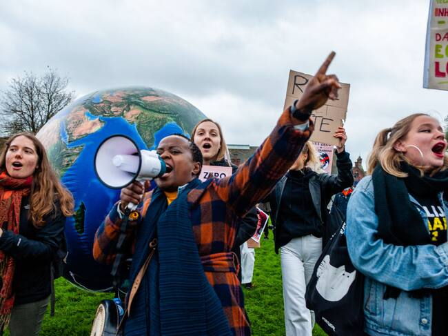 Personas piden un acuerdo global contra el cambio climático en Ámsterdam