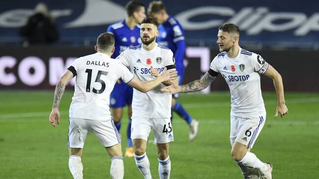 Leeds United's Stuart Dallas (left) celebrates with Mateusz Klich (centre) and Liam Cooper after scoring his side's first goal during the Premier League match at Elland Road, Leeds. (Photo by Peter Powell/PA Images via Getty Images)