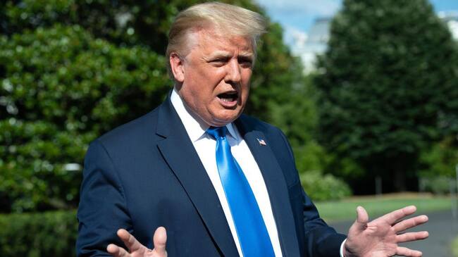 US President Donald Trump speaks to the press as he departs the White House in Washington, DC, on July 11, 2020, for Walter Reed National Military Medical Center to visit wounded troops. (Photo by SAUL LOEB / AFP) (Photo by SAUL LOEB/AFP via Getty Images)