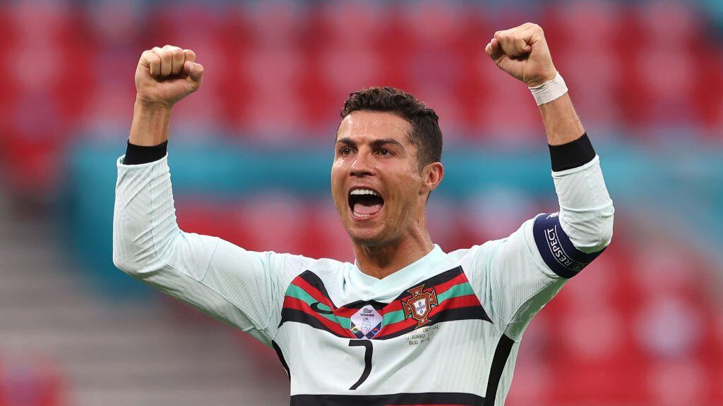BUDAPEST, HUNGARY - JUNE 15: Cristiano Ronaldo of Portugal celebrates after victory in the UEFA Euro 2020 Championship Group F match between Hungary and Portugal at Puskas Arena on June 15, 2021 in Budapest, Hungary. (Photo by Alex Pantling/Getty Images)