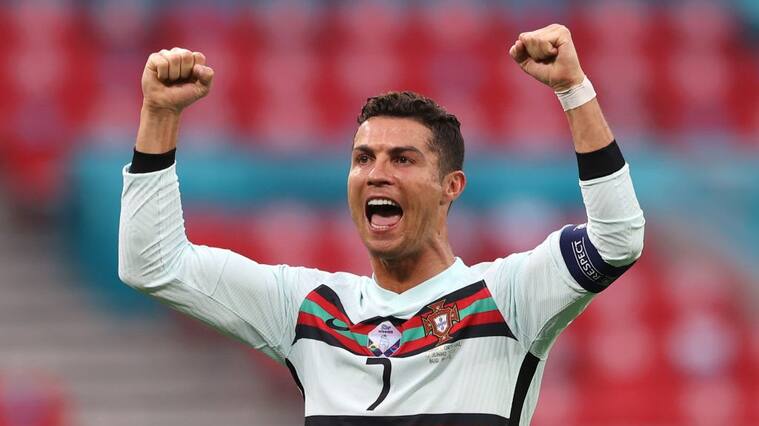 BUDAPEST, HUNGARY - JUNE 15: Cristiano Ronaldo of Portugal celebrates after victory in the UEFA Euro 2020 Championship Group F match between Hungary and Portugal at Puskas Arena on June 15, 2021 in Budapest, Hungary. (Photo by Alex Pantling/Getty Images)