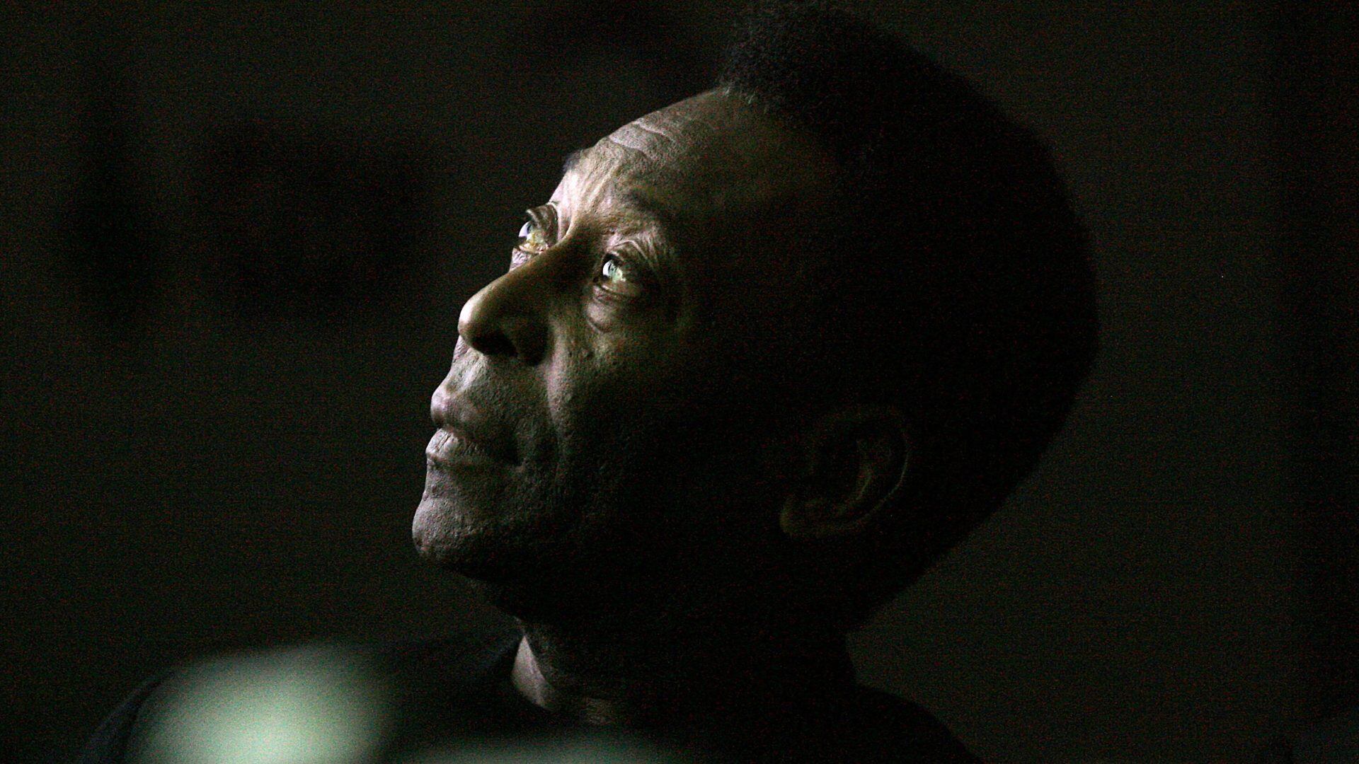 Brazilian soccer legend Edson Arantes do Nacimento, known as Pele, looks on as he attends the opening ceremony of the "Marks of the King" exhibition in Brasilia on June 25, 2008. The exhibition is a tribute to Pele' s profesional career, in the framework of the celebrations of the 50 anniversary of Brazil' s first Football World Cup, obtained in Sweden on June 29, 1958.   AFP PHOTO / Joedson Alves (Photo credit should read JOEDSON ALVES/AFP via Getty Images)