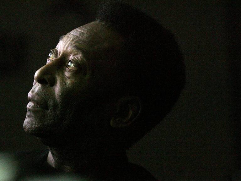 Brazilian soccer legend Edson Arantes do Nacimento, known as Pele, looks on as he attends the opening ceremony of the "Marks of the King" exhibition in Brasilia on June 25, 2008. The exhibition is a tribute to Pele' s profesional career, in the framework of the celebrations of the 50 anniversary of Brazil' s first Football World Cup, obtained in Sweden on June 29, 1958. AFP PHOTO / Joedson Alves (Photo credit should read JOEDSON ALVES/AFP via Getty Images)
