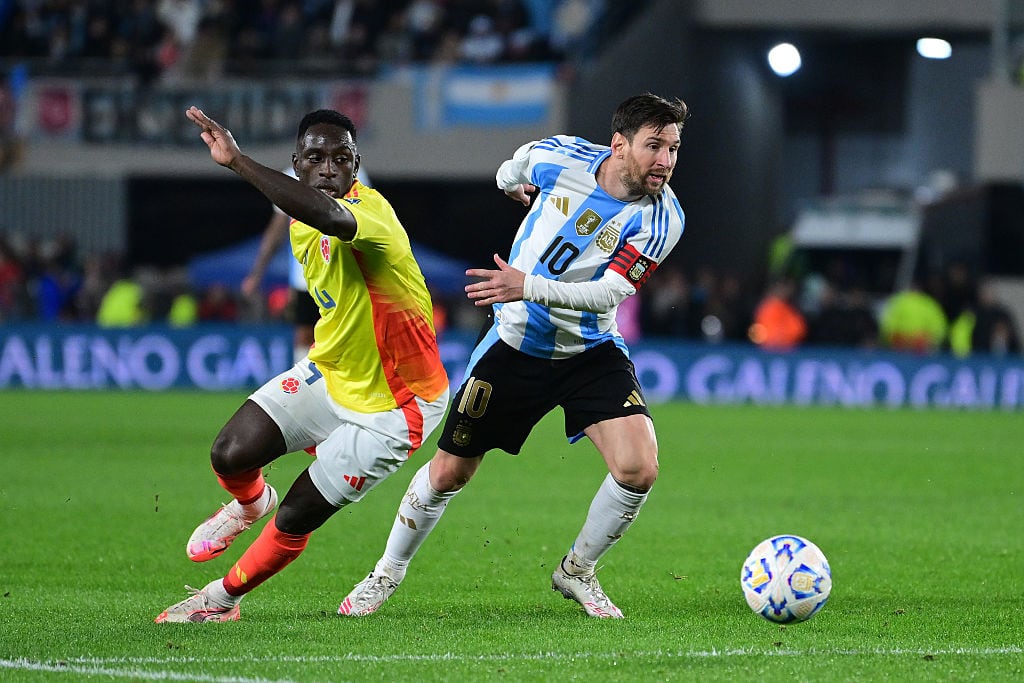 BUENOS AIRES, ARGENTINA - JUNE 10: Deiver Machado of Colombia and Lionel Messi of Argentina battle for the ball during the FIFA World Cup 2026 South American Qualifier match between Argentina and Colombia at Estadio Más Monumental Antonio Vespucio Liberti on June 10, 2025 in Buenos Aires, Argentina. (Photo by Marcelo Endelli/Getty Images)