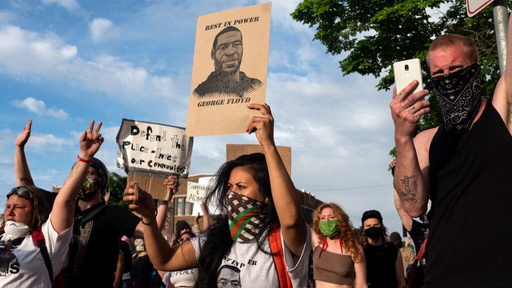 MINNEAPOLIS, MN - MAY 27: Protesters confront police outside the 3rd Police Precinct on May 27, 2020 in Minneapolis, Minnesota. Four Minneapolis police officers have been fired after a video taken by a bystander was posted on social media showing 46-year-old George Floyd's neck being pinned to the ground by an officer as he repeatedly said, "I can’t breathe". Floyd was later pronounced dead while in police custody after being transported to Hennepin County Medical Center.  (Photo by Stephen Maturen/Getty Images)