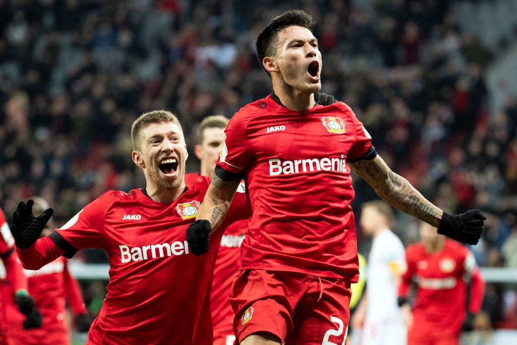 dpatop - 04 March 2020, North Rhine-Westphalia, Leverkusen: Football: DFB-Pokal, Bayer Leverkusen - 1 FC Union Berlin, quarter-finals in the BayArena: Leverkusen Charles Aranguiz (l) celebrates his goal for a 2-1 win with Mitchell Weiser. Photo: Federico Gambarini/dpa - IMPORTANT NOTE: In accordance with the regulations of the DFL Deutsche Fußball Liga and the DFB Deutscher Fußball-Bund, it is prohibited to exploit or have exploited in the stadium and/or from the game taken photographs in the form of sequence images and/or video-like photo series. (Photo by Federico Gambarini/picture alliance via Getty Images)