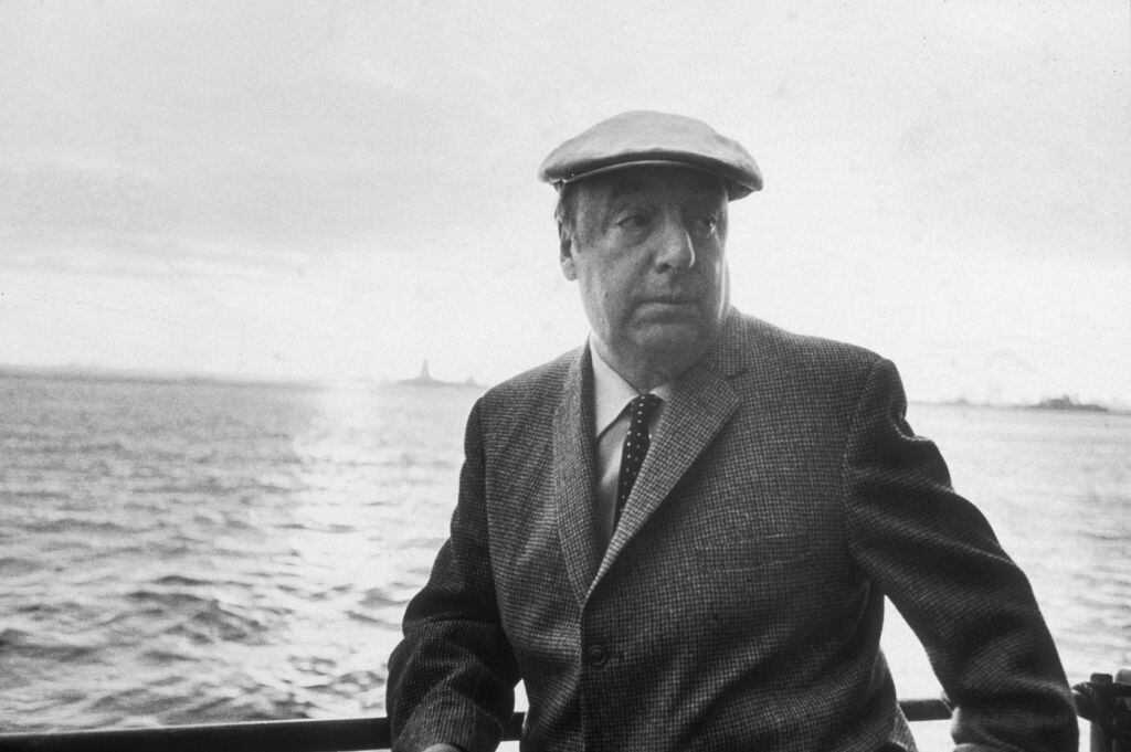 13th June 1966: EXCLUSIVE Chilean poet and activist Pablo Neruda (1904 - 1973) leans on a ship's railing during the 34th annual PEN boat ride around New York City. He wears a cap. (Photo by Sam Falk/New York Times Co./Getty Images)