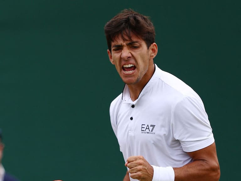 Chile&#039;s Cristian Garin reacts to winning a second set to US player Jenson Brooksby during their men&#039;s singles tennis match on the sixth day of the 2022 Wimbledon Championships at The All England Tennis Club in Wimbledon, southwest London, on July 2, 2022. - RESTRICTED TO EDITORIAL USE (Photo by Adrian DENNIS / AFP) / RESTRICTED TO EDITORIAL USE (Photo by ADRIAN DENNIS/AFP via Getty Images)
