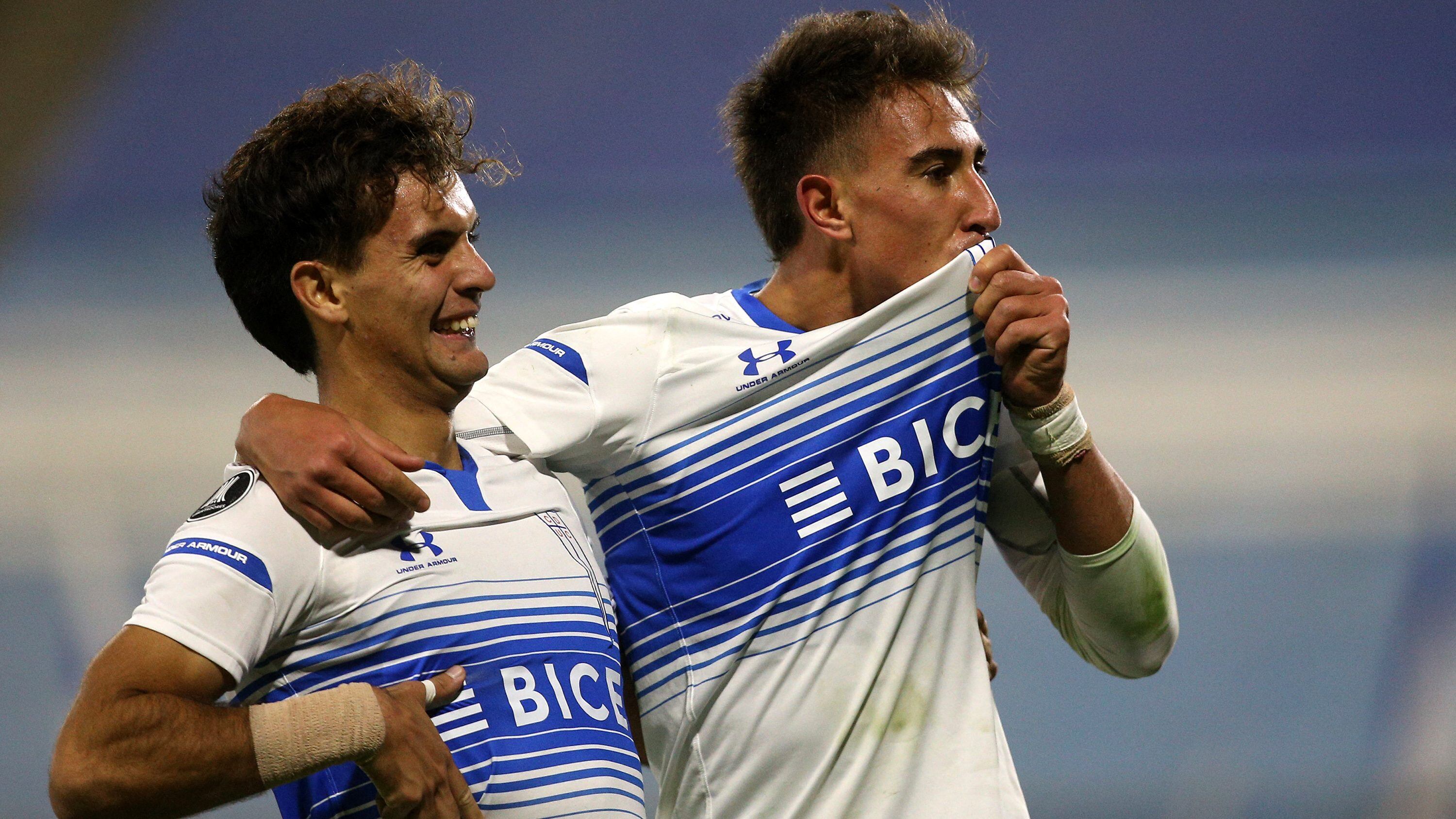 Chile's Universidad Catolica Diego Valencia (R) celebrates a goal during the Copa Libertadores football tournament group stage match between Chile's Universidad Catolica and Colombia's Atletico Nacional at the San Carlos de Apoquindo in Santiago, on May 26, 2021. (Photo by CLAUDIO REYES / AFP) (Photo by CLAUDIO REYES/AFP via Getty Images)