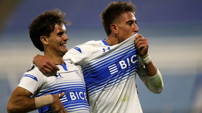 Chile's Universidad Catolica Diego Valencia (R) celebrates a goal during the Copa Libertadores football tournament group stage match between Chile's Universidad Catolica and Colombia's Atletico Nacional at the San Carlos de Apoquindo in Santiago, on May 26, 2021. (Photo by CLAUDIO REYES / AFP) (Photo by CLAUDIO REYES/AFP via Getty Images)