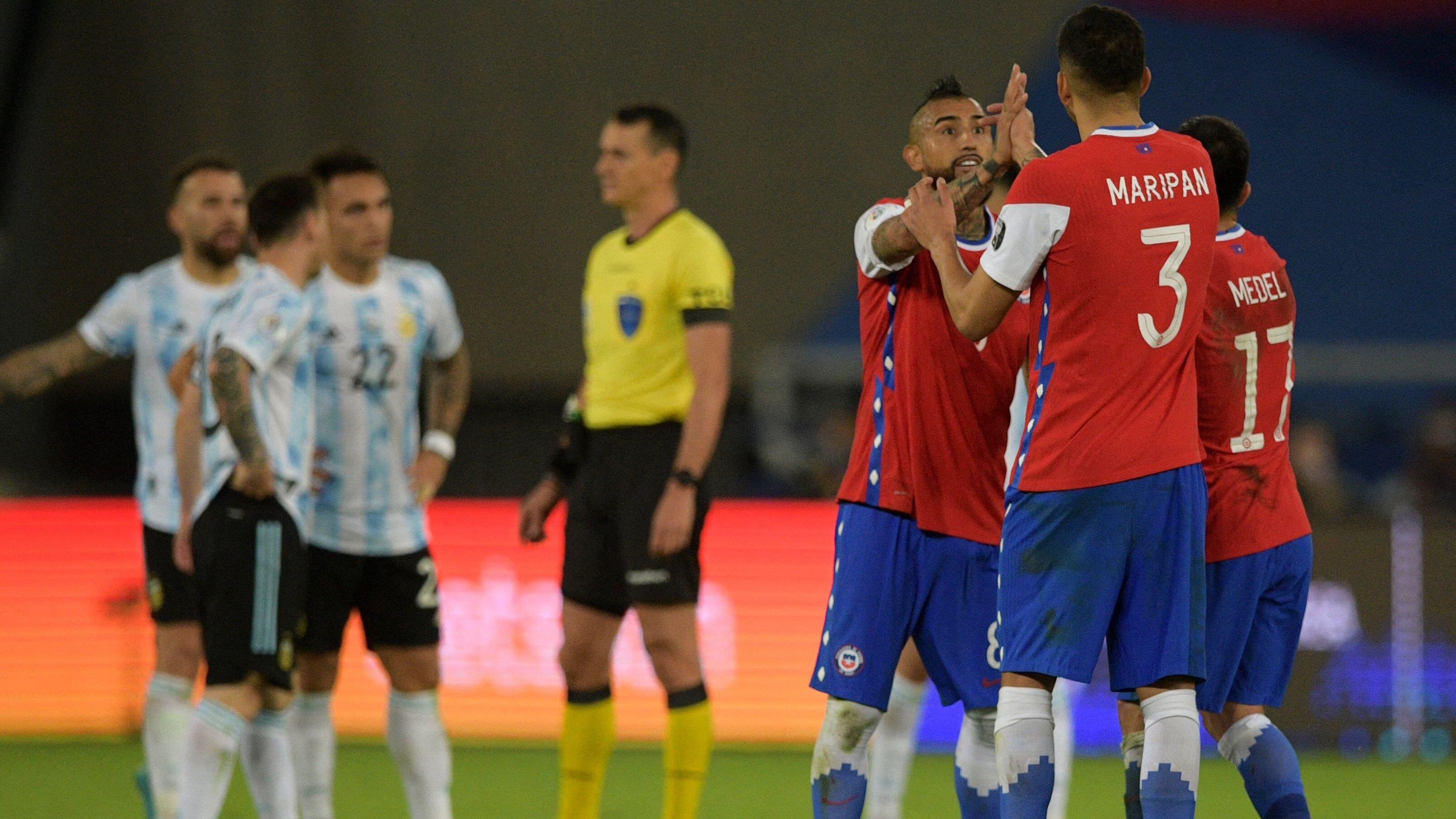 Chile's Arturo Vidal (2-R) celebrates after teammate Eduardo Vargas (out of frame) scored against Argentina after he (Vidal) missed a penalty during their Conmebol Copa America 2021 football tournament group phase match at the Nilton Santos Stadium in Rio de Janeiro, Brazil, on June 14, 2021. (Photo by CARL DE SOUZA / AFP) (Photo by CARL DE SOUZA/AFP via Getty Images)