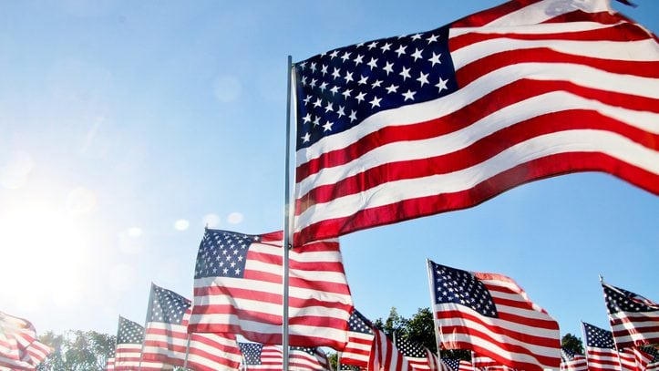 United States flags blow in the wind in Malibu, CA