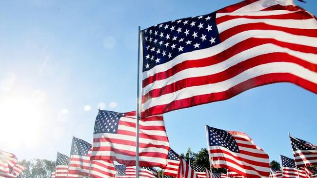 United States flags blow in the wind in Malibu, CA