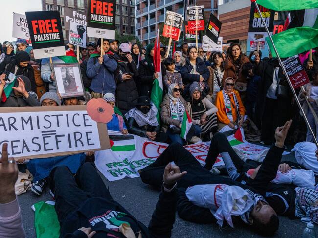 Pro-Palestinian protesters stage a die-in with mock baby corpses during an Armistice Day rally close to the US embassy to call for an immediate ceasefire in Gaza on 11th November 2023 in London, United Kingdom. The rally was organised by Palestine Solidarity Campaign (PSC), Stop the War Coalition, Friends of Al-Aqsa, Muslim Association of Britain and Palestinian Forum in Britain. Mass Palestinian solidarity rallies have been held around the world for a fifth consecutive weekend to call for an end to the Israeli bombardment of Gaza. (photo by Mark Kerrison/In Pictures via Getty Images)