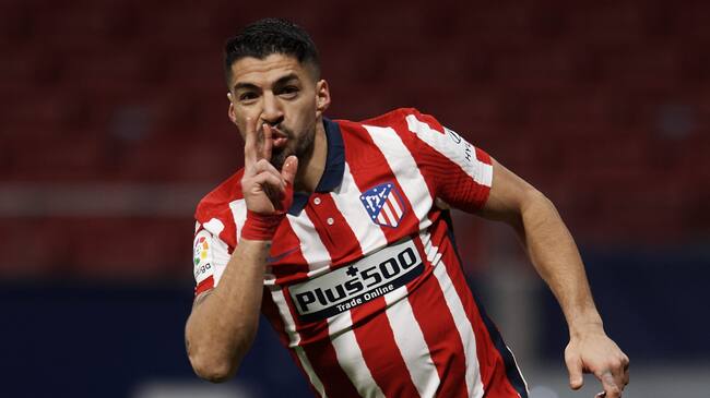 Luis Suarez of Atletico Madrid celebrates after scoring his sides first goal during the La Liga Santander match between Atletico de Madrid and RC Celta at Estadio Wanda Metropolitano on February 8, 2021 in Madrid, Spain. Sporting stadiums around Spain remain under strict restrictions due to the Coronavirus Pandemic as Government social distancing laws prohibit fans inside venues resulting in games being played behind closed doors. (Photo by Jose Breton/Pics Action/NurPhoto via Getty Images)