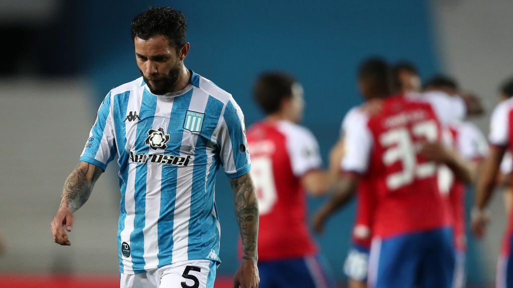 AVELLANEDA, ARGENTINA - SEPTEMBER 17: Eugenio Mena of Racing Club looks dejected after a group F match of Copa CONMEBOL Libertadores 2020 between Racing and Nacional at Juan Domingo Peron Stadium on September 17, 2020 in Avellaneda, Argentina. All games of the tournament are played behind closed doors to avoid spread of COVID-19. (Photo by Agustin Marcarian- Pool/Getty Images)