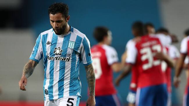 AVELLANEDA, ARGENTINA - SEPTEMBER 17: Eugenio Mena of Racing Club looks dejected after a group F match of Copa CONMEBOL Libertadores 2020 between Racing and Nacional at Juan Domingo Peron Stadium on September 17, 2020 in Avellaneda, Argentina. All games of the tournament are played behind closed doors to avoid spread of COVID-19. (Photo by Agustin Marcarian- Pool/Getty Images)