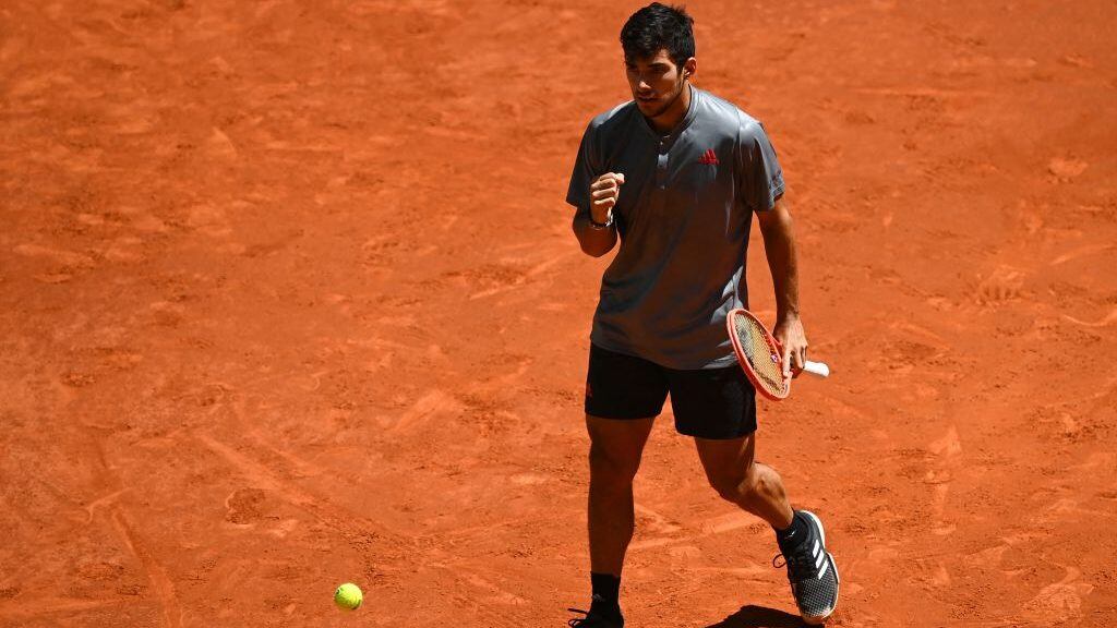 Chile's Christian Garin celebrates winning a point against Russia's Daniil Medvedev during their 2021 ATP Tour Madrid Open tennis tournament singles match at the Caja Magica in Madrid on May 6, 2021. (Photo by GABRIEL BOUYS / AFP) (Photo by GABRIEL BOUYS/AFP via Getty Images)