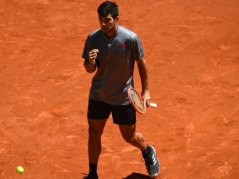 Chile&#039;s Christian Garin celebrates winning a point against Russia&#039;s Daniil Medvedev during their 2021 ATP Tour Madrid Open tennis tournament singles match  at the Caja Magica in Madrid on May 6, 2021. (Photo by GABRIEL BOUYS / AFP) (Photo by GABRIEL BOUYS/AFP via Getty Images)