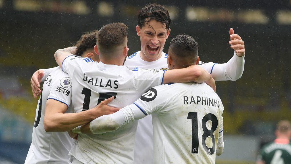 TOPSHOT - Leeds United's Brazilian-born Spanish striker Rodrigo celebrates with teammates after scoring his team's third goal during the English Premier League football match between Leeds United and Tottenham Hotspur at Elland Road in Leeds, northern England on May 8, 2021. - RESTRICTED TO EDITORIAL USE. No use with unauthorized audio, video, data, fixture lists, club/league logos or 'live' services. Online in-match use limited to 120 images. An additional 40 images may be used in extra time. No video emulation. Social media in-match use limited to 120 images. An additional 40 images may be used in extra time. No use in betting publications, games or single club/league/player publications. (Photo by Michael Regan / POOL / AFP) / RESTRICTED TO EDITORIAL USE. No use with unauthorized audio, video, data, fixture lists, club/league logos or 'live' services. Online in-match use limited to 120 images. An additional 40 images may be used in extra time. No video emulation. Social media in-match use limited to 120 images. An additional 40 images may be used in extra time. No use in betting publications, games or single club/league/player publications. / RESTRICTED TO EDITORIAL USE. No use with unauthorized audio, video, data, fixture lists, club/league logos or 'live' services. Online in-match use limited to 120 images. An additional 40 images may be used in extra time. No video emulation. Social media in-match use limited to 120 images. An additional 40 images may be used in extra time. No use in betting publications, games or single club/league/player publications. (Photo by MICHAEL REGAN/POOL/AFP via Getty Images)