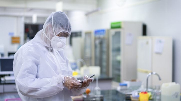 A male doctor works in the bio-nucleic acid laboratory