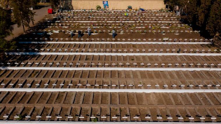 Aerial view of graves already dug at the General Cemetery in Santiago May 14, 2020, amid the new coronavirus pandemic. - Health authorities ordered the General Cemetery of Santiago to enable over 1,700 graves under the possibility of an increase in deaths from COVID-19. (Photo by MARTIN BERNETTI / AFP) (Photo by MARTIN BERNETTI/AFP via Getty Images)