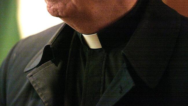 403101 05: The collar of a priest is seen at St. Adalbert Catholic Church March 29, 2002 in Chicago, IL. Good Friday's "Way of the Cross" services is celebrated by Roman Catholics all over the world. (Photo by Tim Boyle/Getty Images)