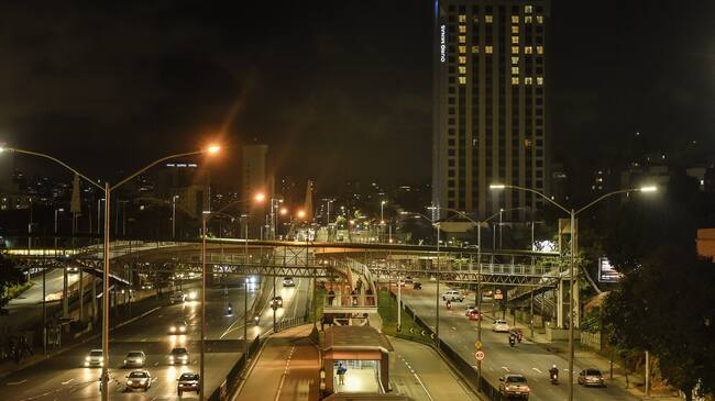 BELO HORIZONTE, BRAZIL - APRIL 9: Window lights are illuminated spelling the work Fé (in English: faith) at the Hotel Ouro Minas building honoring the victims of Covid-19 on April 9, 2020 in Belo Horizonte, Brazil. According to the Ministry of Health, Brazil currently has 15,927 confirmed cases of coronavirus (COVID-19) and at least 800 registered deaths. (Photo by Pedro Vilela/Getty Images)