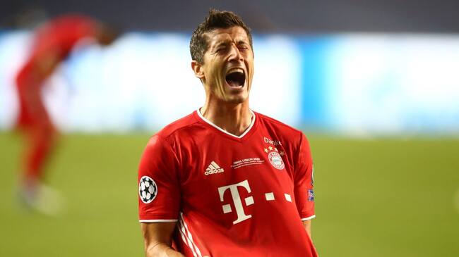 LISBON, PORTUGAL - AUGUST 23: Robert Lewandowski of FC Bayern Munich celebrates following his team's victory in the UEFA Champions League Final match between Paris Saint-Germain and Bayern Munich at Estadio do Sport Lisboa e Benfica on August 23, 2020 in Lisbon, Portugal. (Photo by Julian Finney - UEFA/UEFA via Getty Images)