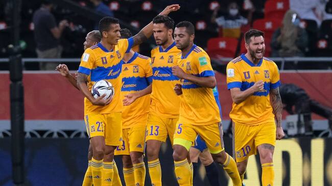 DOHA, QATAR - FEBRUARY 04: Andre-Pierre Gignac of Tigres UANL (R) celebrates after scoring their sides second goal from the penalty spot during the FIFA Club World Cup Qatar 2020 Second Round match between Tigres UANL and Ulsan Hyundai FC at the Ahmad Bin Ali Stadium on February 04, 2021 in Doha, Qatar. FIFA are allowing a limited number of spectators (12,000) to be in attendance as Covid-19 pandemic restrictions are eased. (Photo by Simon Holmes - FIFA/FIFA via Getty Images)