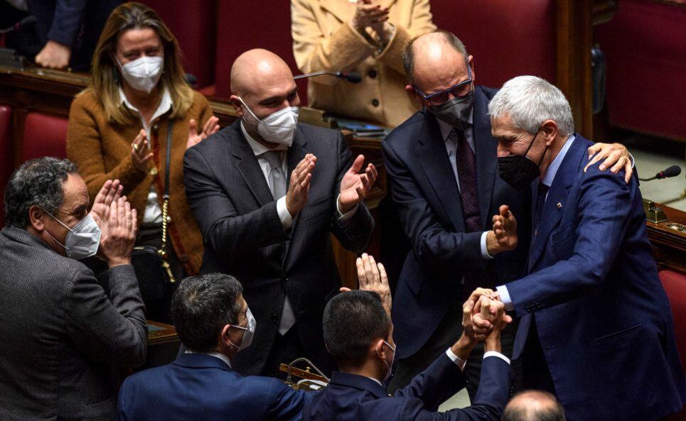 ROME, ITALY - JANUARY 29: Enrico Letta, Italian Senator Pier Ferdinando Casini and members of the Italian Parliament stand to applaud Sergio Mattarella after a quorum was reached during the sixth voting day for the election of the new Italian President, at the Chamber of Deputies, on January 29, 2022 in Rome, Italy. Sergio Mattarella was re-elected as Italian president. (Photo by Antonio Masiello/Getty Images)