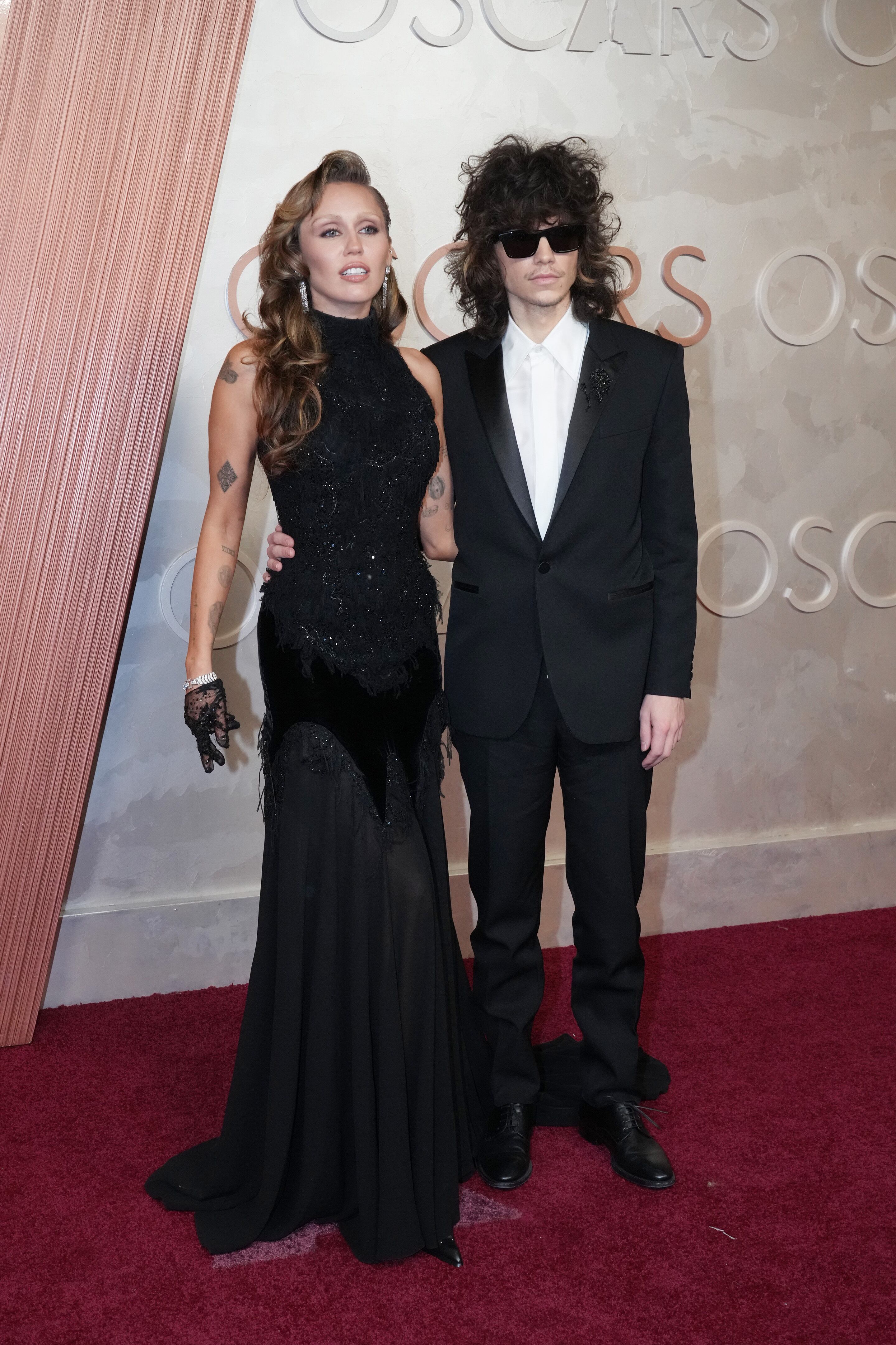 HOLLYWOOD, CALIFORNIA - MARCH 02: Miley Cyrus and Maxx Morando attend the 97th Annual Oscars at Dolby Theatre on March 02, 2025 in Hollywood, California. (Photo by Jeff Kravitz/FilmMagic)