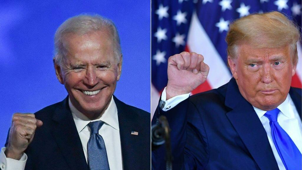 TOPSHOT - (COMBO) This combination of pictures created on November 04, 2020 shows Democratic presidential nominee Joe Biden (L) in Wilmington, Delaware, and US President Donald Trump (R) in Washington, DC both pumping their fist during an election night speech early November 4, 2020. - President Donald Trump and Democratic challenger Joe Biden are battling it out for the White House, with polls closed across the United States -- and the American people waiting for results in key battlegrounds still up for grabs, one day after the US presidential election November 03. (Photos by ANGELA WEISS and MANDEL NGAN / AFP) (Photo by ANGELA WEISS,MANDEL NGAN/AFP via Getty Images)