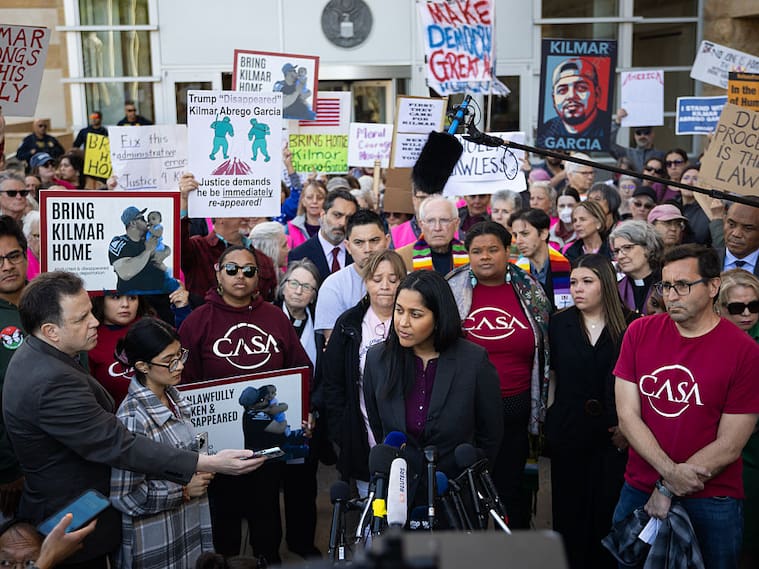 GREENBELT, MD - APRIL 15:Rina Gandhi, lawyer in the case Kilmar Abrego García's release, speaks to press outside the U.S. District Court for the District of Maryland on April 15, 2025 in Greenbelt, MD. Garcia's wife Jennifer Vasquez Sura stands to Gandhi's side (right). Kilmar Abrego García was wrongfully deported to El Salvadorian prison, and despite the Supreme Court's ruling that he must be returned to the United States, President Donald Trump is refusing to do so.
(Maansi Srivastava/ For The Washington Post via Getty Images)
