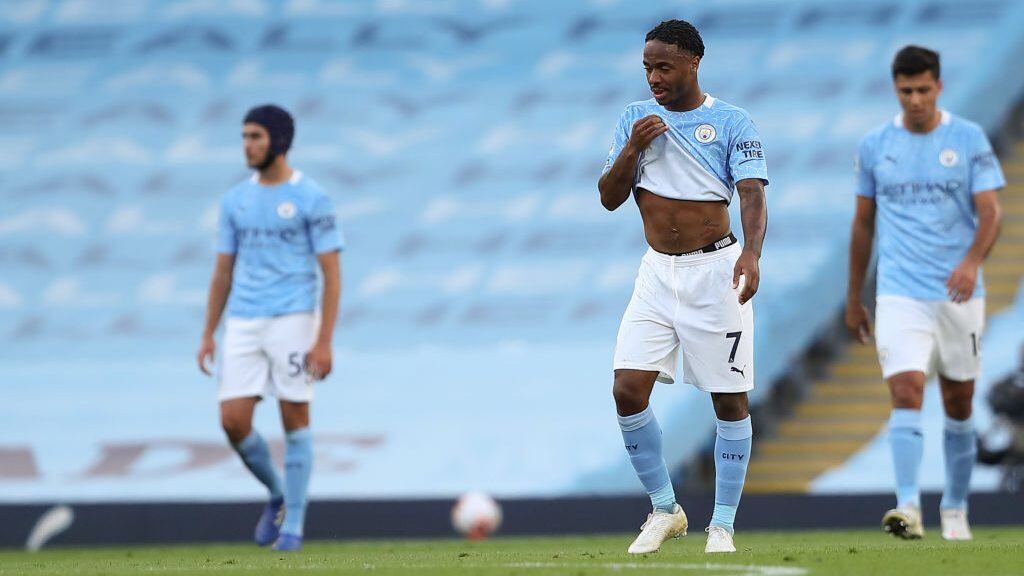 MANCHESTER, ENGLAND - SEPTEMBER 27: A dejected Raheem Sterling of Manchester City after Jamie Vardy of Leicester City scored a goal from the penalty spot to make it 1-1 during the Premier League match between Manchester City and Leicester City at Etihad Stadium on September 27, 2020 in Manchester, United Kingdom. Sporting stadiums around the UK remain under strict restrictions due to the Coronavirus Pandemic as Government social distancing laws prohibit fans inside venues resulting in games being played behind closed doors. (Photo by James Williamson - AMA/Getty Images)