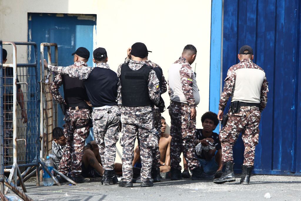 GUAYAQUIL, ECUADOR - APRIL 14: Inmates are arrested by penitentiary guards on April 14, 2023 in Guayaquil, Ecuador. Authorities report at least 3 injured inmates after a fight inside the 'Centro de Rehabilitacion Social de Varones N. 1' de Guayaquil known as the 'Del Litoral Prison'. Official reports mention that the situation has been controlled. (Photo by Gerardo Menoscal/Agencia Press South/Getty Images)