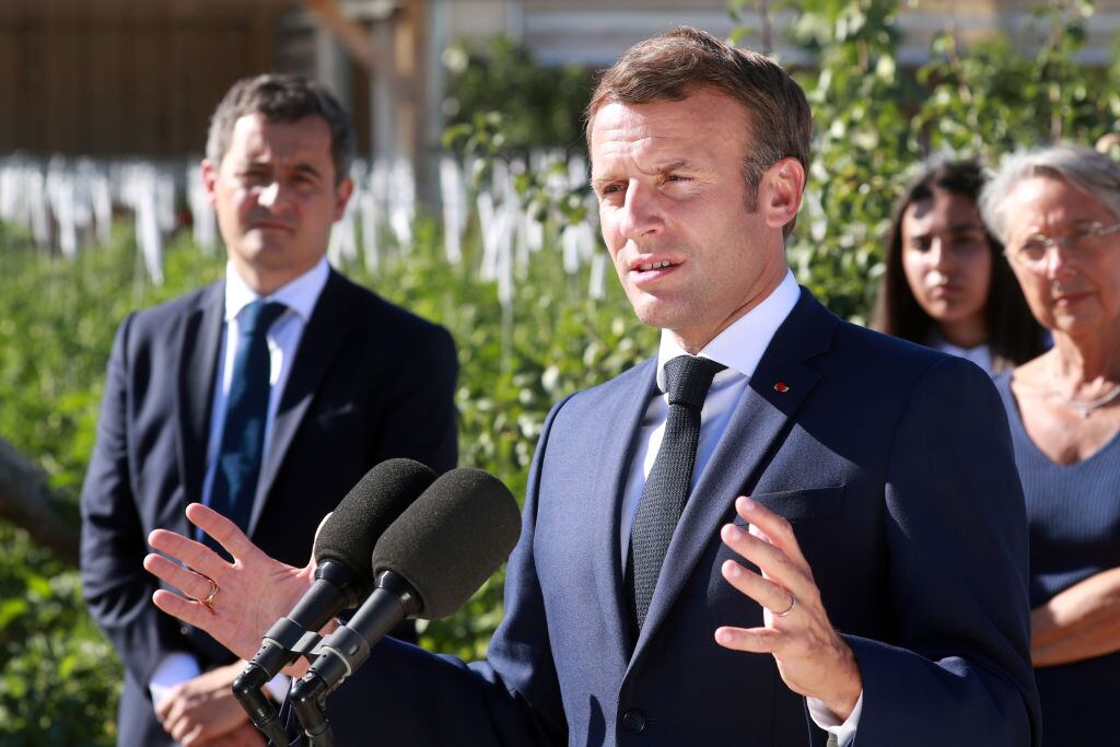 Emmanuel Macron y Gerald Darmanin